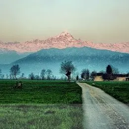 View of the Alps from the plain
